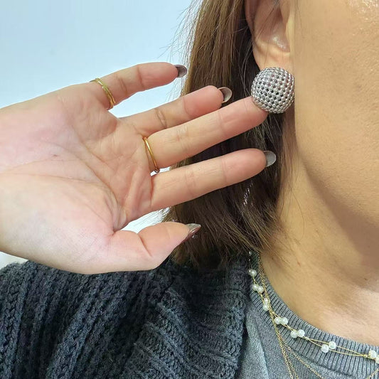 Orecchini “Forma” – La calma della forza