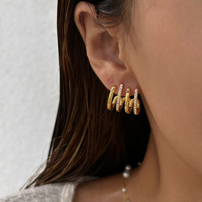 Orecchini a Spirale con Dettagli Luminosi