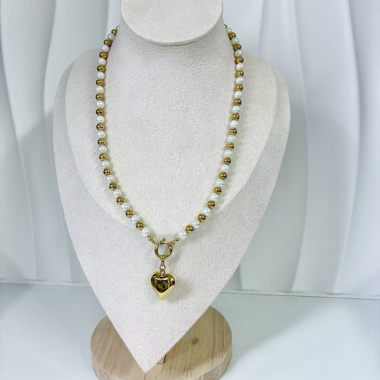 (C219)Collana bicolore con cuore bombato in acciaio inox