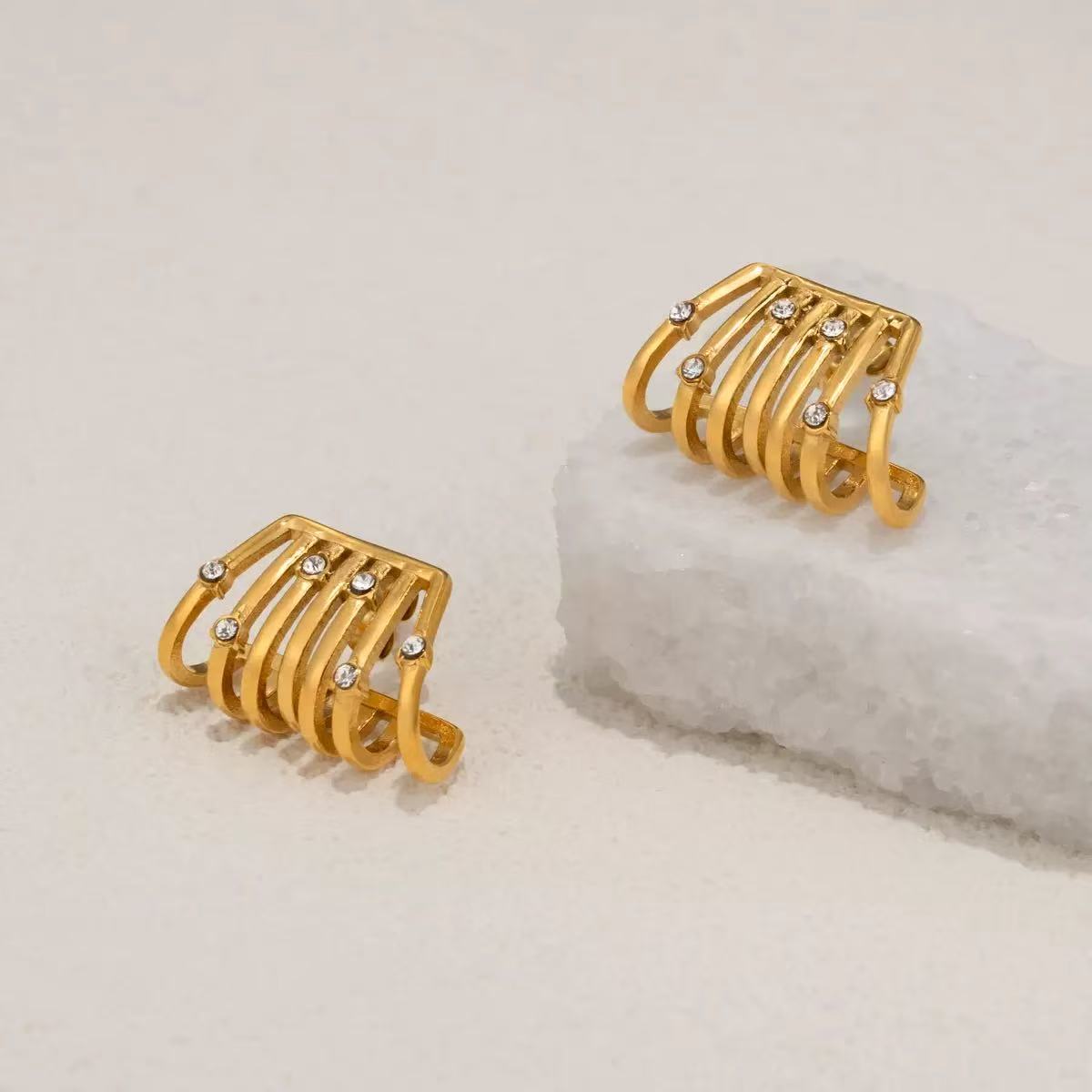 Orecchini Geometrici con Dettagli Luminosi