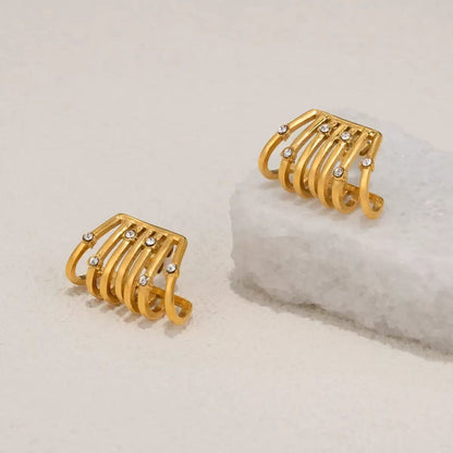 Orecchini Geometrici con Dettagli Luminosi