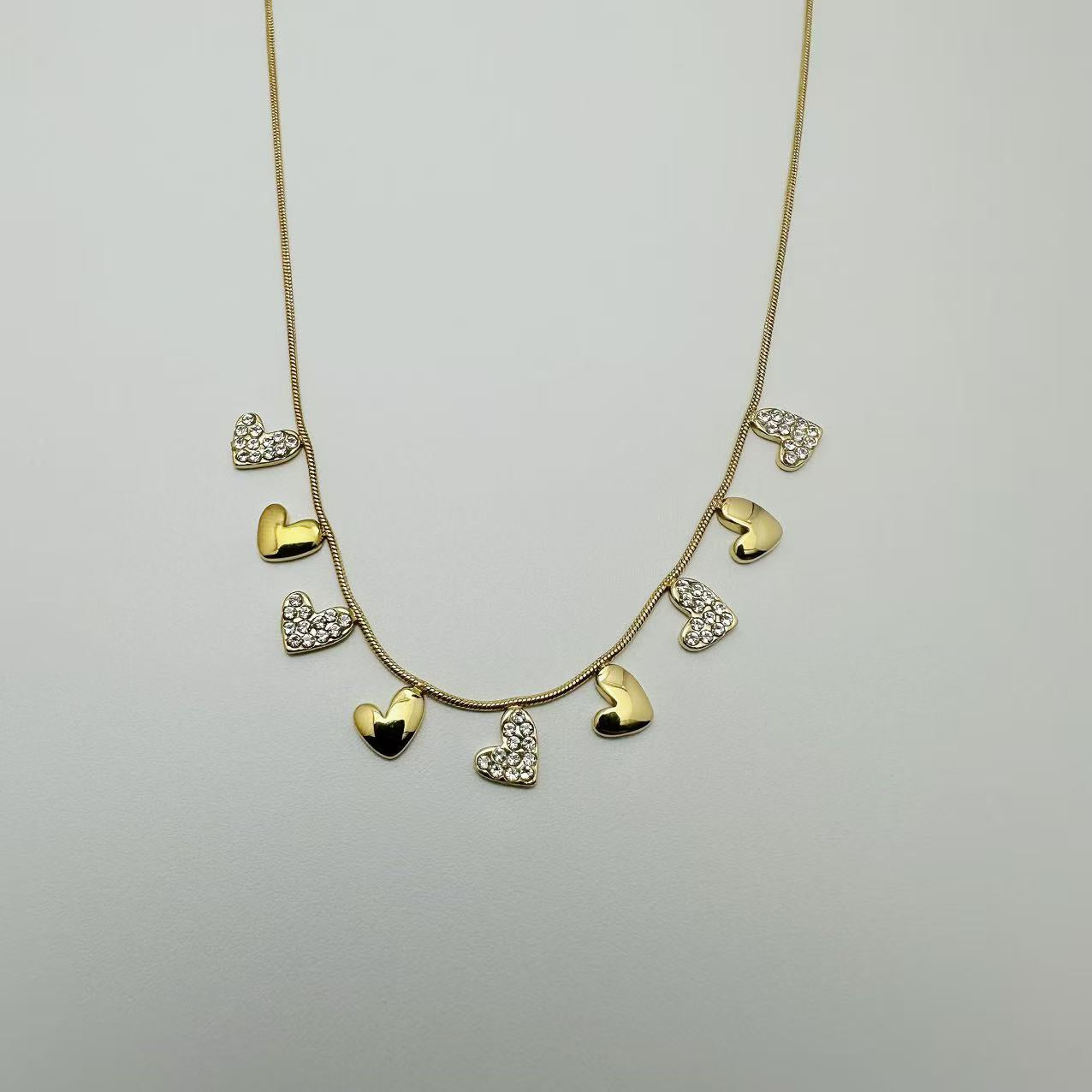 (C298)Collana cuoricini e chevalier