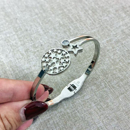 Bracciale rigido silver con or stelle con la chiusura a molla