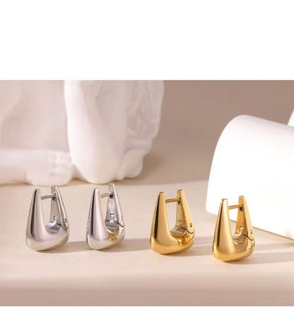 Orecchini "Liquid" – Essenzialità Scultorea in Acciaio