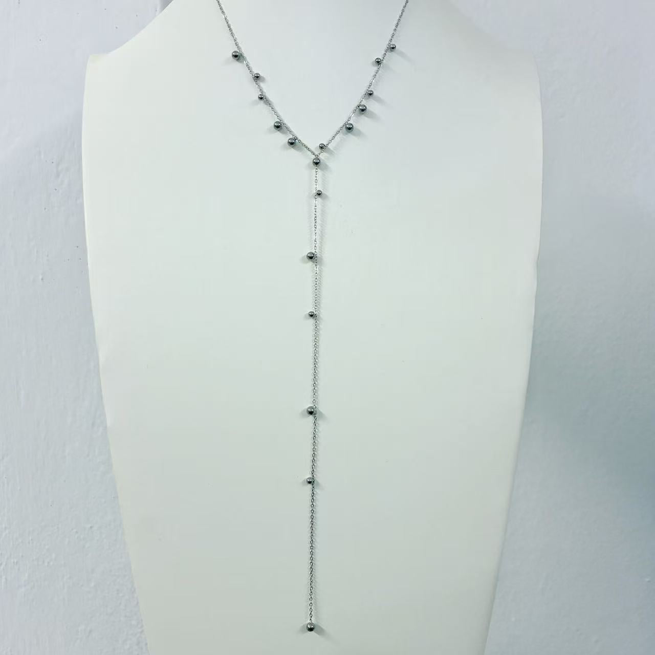 Collana palline con pendente lungo