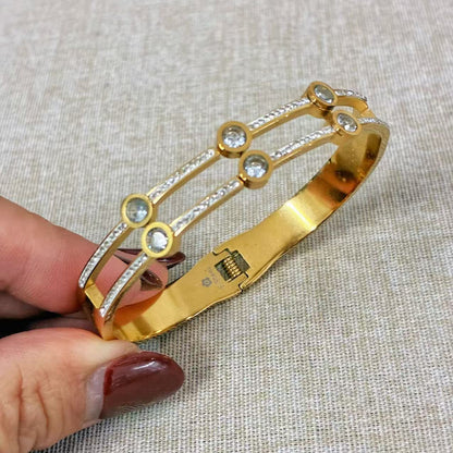 Bracciale rigido strass dipping filo con la chiusura a molla