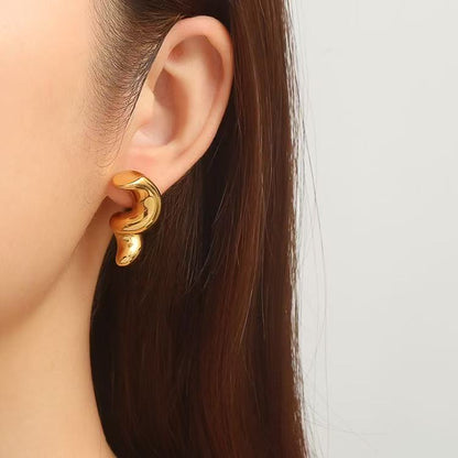 Orecchini a Spirale Moderna — Linee Morbide e Stile Artistico