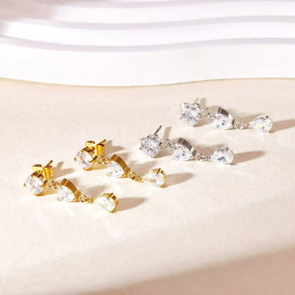 Orecchini "Trilogia di Cristallo" – Pendenti Luminosi in Acciaio