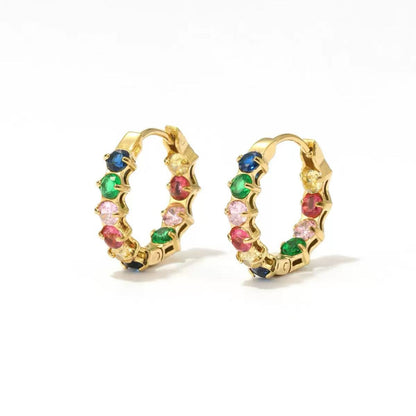 Orecchini "Infinity Glow" – Cerchi Intrecciati con Castone di Luce