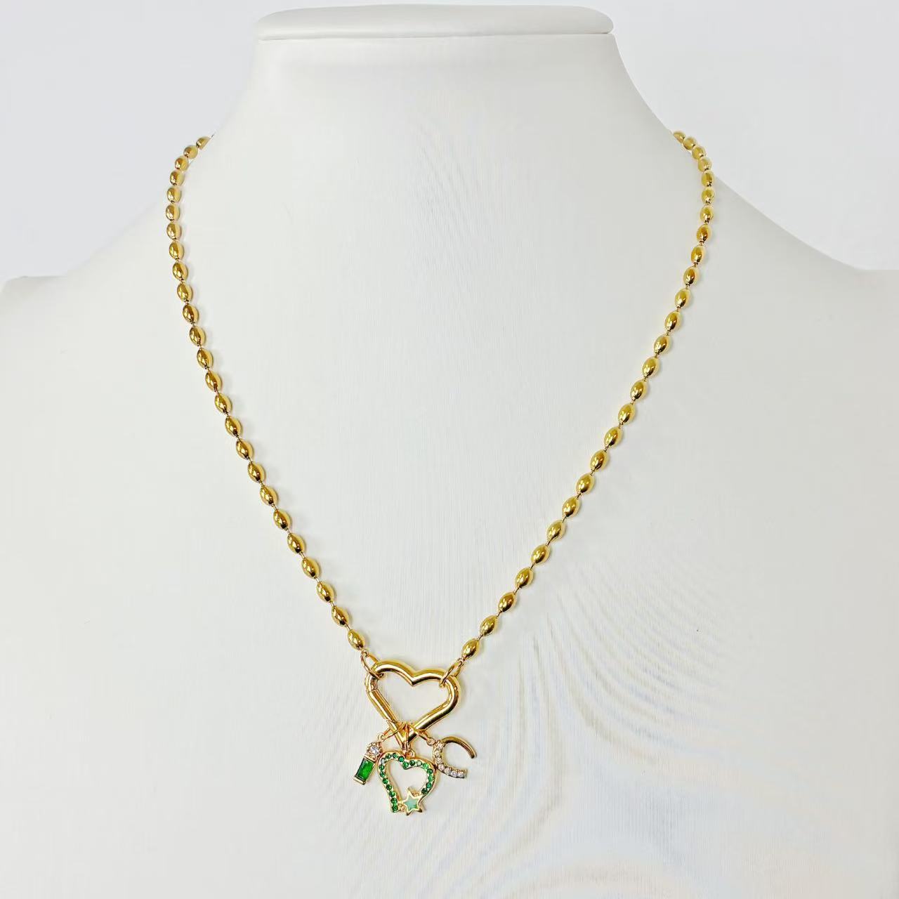 Collana “Emerald Heart Charms” – Cuore, Luna &amp; Stella