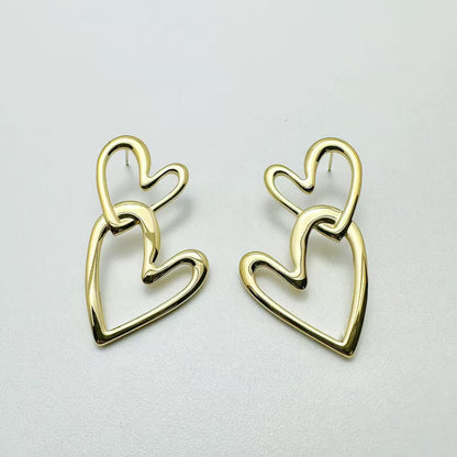 (O084)Orecchini doppio cuore in acciaio inox