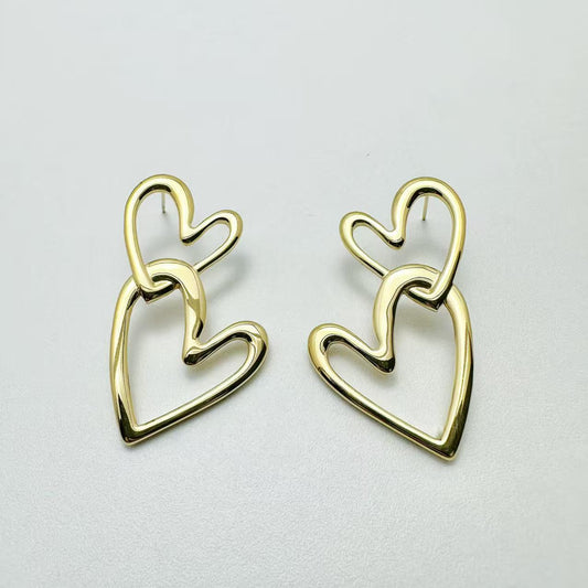 (O084)Orecchini doppio cuore in acciaio inox