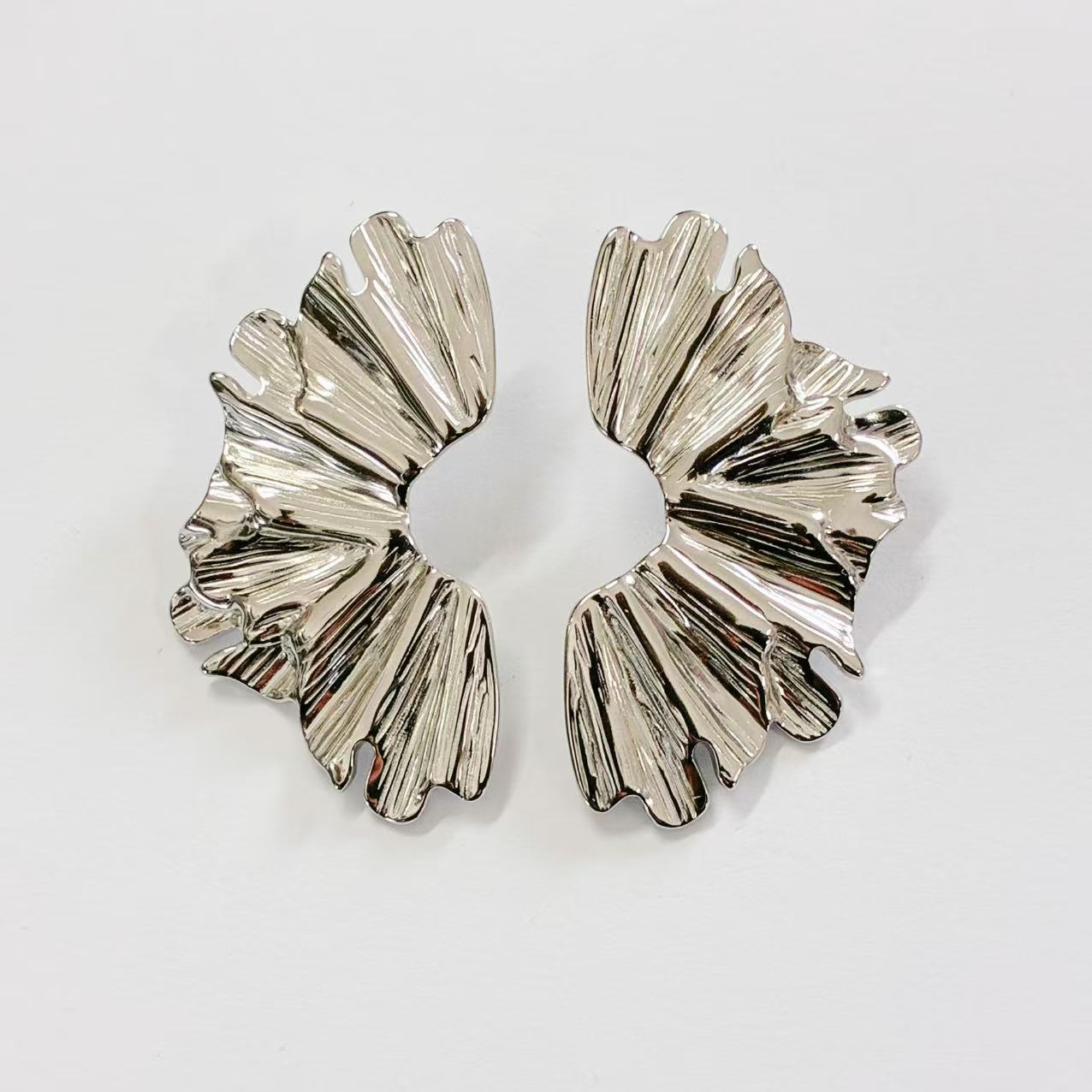 Orecchini Scultorei “Vento d’Acciaio”