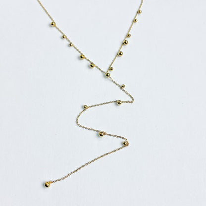 Collana palline con pendente lungo