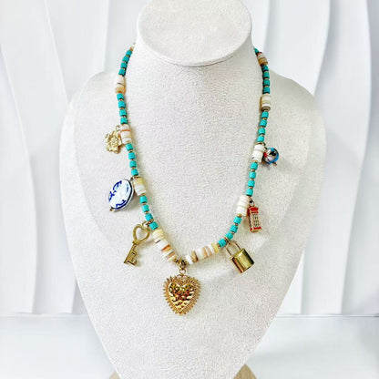 (C259)Collana con tanti pendenti in acciaio inox